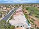 An elevated view shows a community with golf course, manicured lawns and desert landscaping at 9513 Villa Ridge Dr, Las Vegas, NV 89134