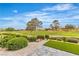 Expansive backyard with meticulous landscaping overlooks the lush green golf course at 9513 Villa Ridge Dr, Las Vegas, NV 89134