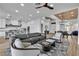 Spacious open-concept living room with kitchen, dining area and luxury finishes at 9513 Villa Ridge Dr, Las Vegas, NV 89134