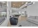 Spacious living space with wood-look floors, modern lighting, and open layout perfect for entertaining at 9513 Villa Ridge Dr, Las Vegas, NV 89134