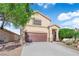 Charming two-story home featuring a well-maintained yard with a two car garage and desert landscaping at , North Las Vegas, NV 89031