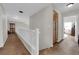 Upstairs hallway with built-in storage and access to the bedrooms at , North Las Vegas, NV 89031