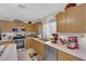 Well-appointed kitchen showcasing wood cabinetry, stainless steel appliances, and ample counter space for cooking at , North Las Vegas, NV 89031