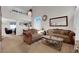 Spacious living area with comfortable sofas, chandelier, and seamless flow to other living areas at , North Las Vegas, NV 89031