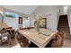 Open-concept living and dining area with staircase and abundant natural light at , North Las Vegas, NV 89031
