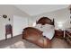 Well-lit main bedroom featuring a large bed and closet for ample storage at , North Las Vegas, NV 89031
