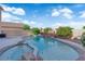 Beautiful backyard pool and spa with waterfall feature and lush landscaping at , North Las Vegas, NV 89031