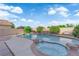 Inviting backyard pool with spa, waterfall, and lush landscaping at , North Las Vegas, NV 89031