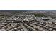 Wide aerial view of an extensive neighborhood showcasing the density and well-planned layout of homes and streets at 10791 Silver Lace Ln, Las Vegas, NV 89135