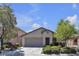 Charming single-story home features a two-car garage and well-manicured landscaping at 10791 Silver Lace Ln, Las Vegas, NV 89135