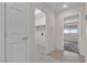 Convenient laundry room near living area at 10791 Silver Lace Ln, Las Vegas, NV 89135