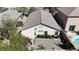 Cozy backyard featuring desert landscaping and a convenient private pool, surrounded by well-maintained neighboring homes at 10791 Silver Lace Ln, Las Vegas, NV 89135