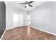 An unstaged bedroom featuring wood floors at 1088 Casady Hollow Ave, Henderson, NV 89012