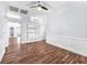 Spacious living room featuring hardwood floors and built-in shelving at 1088 Casady Hollow Ave, Henderson, NV 89012