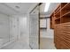 This bathroom suite features tiled floors and walk-in showers with glass doors at 11158 Antonine Wall Ct, Las Vegas, NV 89141