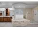 Luxurious bathroom boasts a large soaking tub, walk-in shower, and ample vanity space at 11158 Antonine Wall Ct, Las Vegas, NV 89141