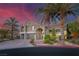 Beautiful two-story home features a landscaped yard and a stylish paver driveway at 11158 Antonine Wall Ct, Las Vegas, NV 89141