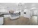 Spacious white kitchen featuring granite counters, ample storage, and modern appliances at 11158 Antonine Wall Ct, Las Vegas, NV 89141