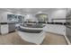 Stylish kitchen with granite countertops, white cabinetry, stainless steel appliances, and garden window at 11158 Antonine Wall Ct, Las Vegas, NV 89141