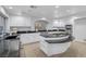 Elegant kitchen boasts granite countertops, stainless steel appliances, and lots of natural light at 11158 Antonine Wall Ct, Las Vegas, NV 89141