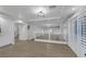 Spacious living area showcasing the staircase, recessed lighting, and white railing at 11158 Antonine Wall Ct, Las Vegas, NV 89141