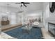 Bright open concept featuring living and dining areas in a naturally lit setting at 11158 Antonine Wall Ct, Las Vegas, NV 89141