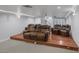 Movie room with reclining seats on a raised floor at 11158 Antonine Wall Ct, Las Vegas, NV 89141