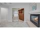 The main suite shows the bathroom entry, fireplace, and access to a mirrored walk-in closet at 11158 Antonine Wall Ct, Las Vegas, NV 89141