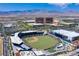Aerial view of Las Vegas Ballpark with a green field, seating, and views of the surrounding cityscape at 11398 Belmont Lake Dr # 104, Las Vegas, NV 89135