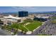 Aerial view showcasing a landscaped business park with well-maintained greenery and inviting pedestrian walkways at 11398 Belmont Lake Dr # 104, Las Vegas, NV 89135