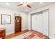 Guest bedroom with hardwood floors, murphy bed and built-ins at 11398 Belmont Lake Dr # 104, Las Vegas, NV 89135