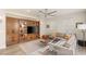 Cozy living room with a built-in entertainment center and comfortable seating arrangements at 11398 Belmont Lake Dr # 104, Las Vegas, NV 89135