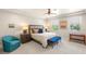 Well-lit main bedroom features neutral tones, ceiling fan, and ample natural light at 11398 Belmont Lake Dr # 104, Las Vegas, NV 89135