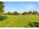 Expansive green park area, perfect for recreational activities and community gatherings at 11398 Belmont Lake Dr # 104, Las Vegas, NV 89135