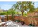 Charming patio area with a built-in grill, perfect for outdoor entertaining and relaxation at 11398 Belmont Lake Dr # 104, Las Vegas, NV 89135