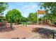 Well-maintained playground with swings and slides, creating an inviting and enjoyable space for children at 11398 Belmont Lake Dr # 104, Las Vegas, NV 89135