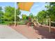Modern playground with climbing structures and slides, offering a fun and engaging environment for play at 11398 Belmont Lake Dr # 104, Las Vegas, NV 89135