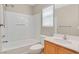This bathroom offers a shower with tub and vanity at 11934 Wild Chamomile St, Las Vegas, NV 89183