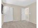 This bedroom has neutral paint and carpet, dual windows, and a closet at 11934 Wild Chamomile St, Las Vegas, NV 89183