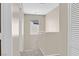 Hallway that leads to the second floor with carpeted flooring and neutral wall color at 11934 Wild Chamomile St, Las Vegas, NV 89183