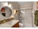 Bathroom featuring a glass enclosed shower, modern vanity, and stylish finishes at 1432 Castle Crest Dr, Las Vegas, NV 89117