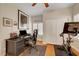 Bedroom/office with hardwood floors and an exercise bike at 1432 Castle Crest Dr, Las Vegas, NV 89117