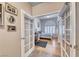 Comfortable bedroom with desk space and bright windows, perfect for relaxing and working at 1432 Castle Crest Dr, Las Vegas, NV 89117
