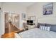 Comfortable bedroom featuring an work area with multiple monitors at 1432 Castle Crest Dr, Las Vegas, NV 89117