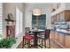 Cozy dining area with breakfast nook and views of the backyard at 1432 Castle Crest Dr, Las Vegas, NV 89117