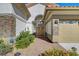 A charming single-story home with a secure gated entrance, and desert landscaping at 1432 Castle Crest Dr, Las Vegas, NV 89117