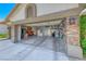 Spacious three-car garage with ample storage, workbench, and organization system at 1432 Castle Crest Dr, Las Vegas, NV 89117