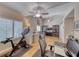 Bright home office space, featuring exercise equipment and large windows with ample storage at 1432 Castle Crest Dr, Las Vegas, NV 89117
