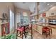 Kitchen dining area includes a view of the backyard at 1432 Castle Crest Dr, Las Vegas, NV 89117