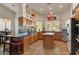 Spacious kitchen with a central island, stainless steel appliances, and ample counter space at 1432 Castle Crest Dr, Las Vegas, NV 89117
